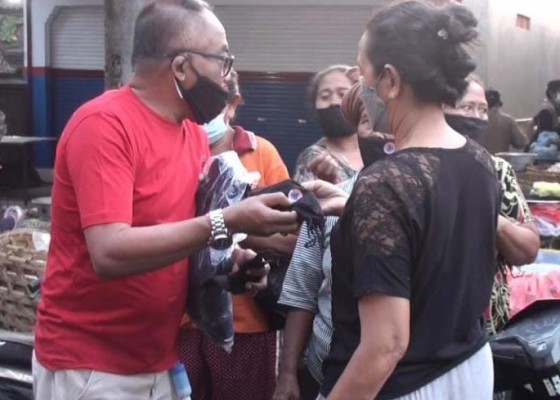Nusabali.com - bpbd-gianyar-bagikan-50000-masker-kepada-masyarakat