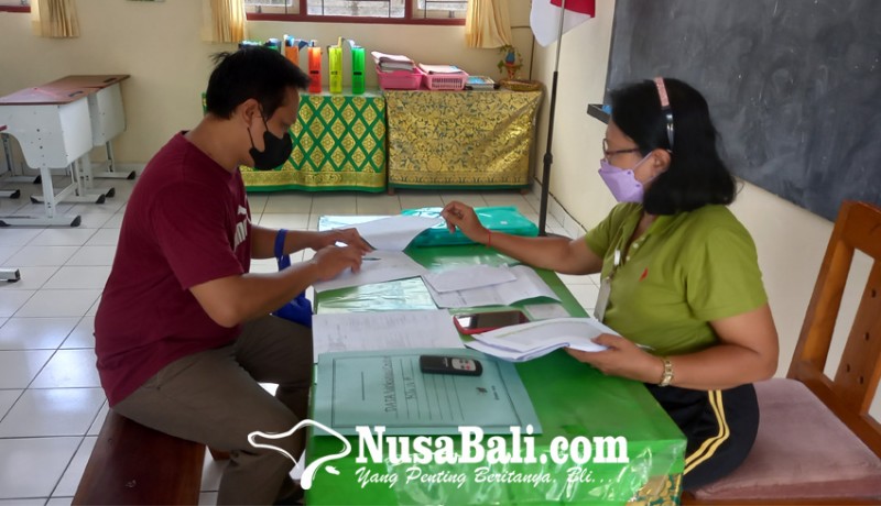 www.nusabali.com-benturan-dengan-jadwal-vaksinasi-pembagian-rapor-siswa-dimajukan