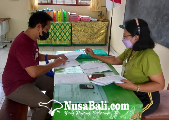 Nusabali.com - benturan-dengan-jadwal-vaksinasi-pembagian-rapor-siswa-dimajukan
