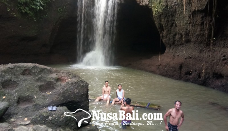 www.nusabali.com-jelang-nataru-kunjungan-wisatawan-di-suwat-waterfall-meningkat