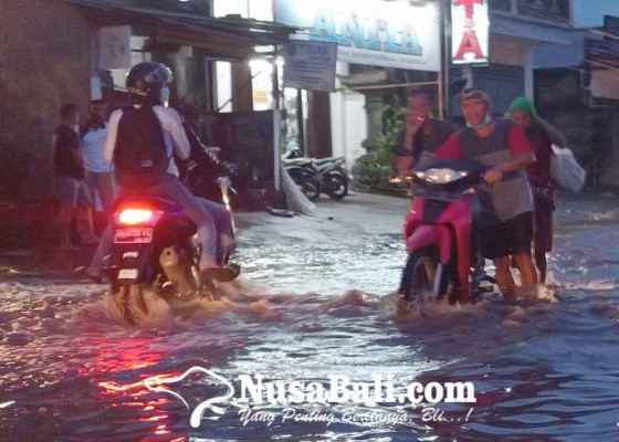 Nusabali.com - jalanan-di-desa-baktiseraga-tergenang-banjir