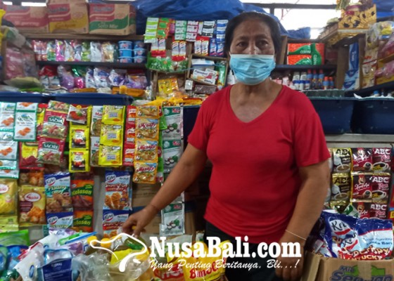 Nusabali.com - harga-minyak-goreng-turun-pedagang-pasar-menjerit