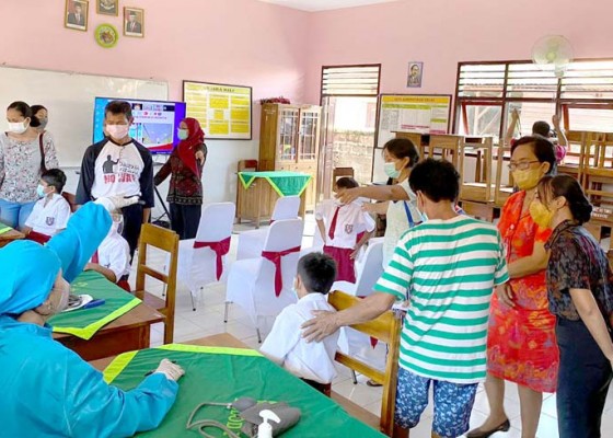 Nusabali.com - polres-tabanan-ikut-kejar-target-vaksinasi-anak-6-11-tahun