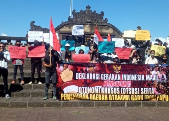 Nusabali.com - gelar-aksi-damai-di-denpasar-gerakan-indonesia-maju-dukung-otsus-papua
