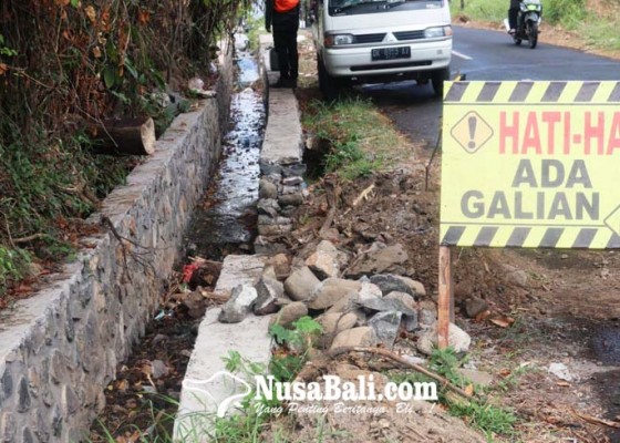 Nusabali.com - jalan-srikandi-diperbaiki-drainase-dinormalisasi