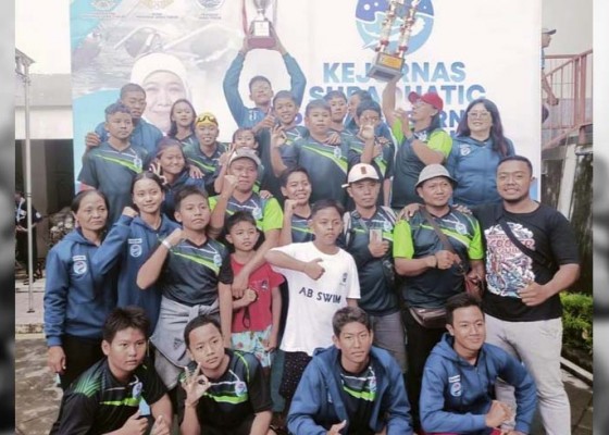 Nusabali.com - total-raih-25-emas-9-perak-dan-2-perunggu-badung-juara-umum-kejuaraan-finswimming-di-pasuruan