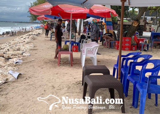 Nusabali.com - cuaca-ekstrem-wisatawan-pantai-kuta-menurun-drastis