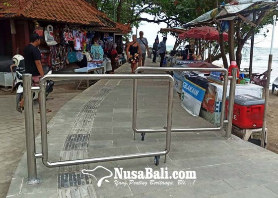 Nusabali.com - cegah-motor-masuk-kawasan-jogging-track-desa-adat-kuta-pasang-portal