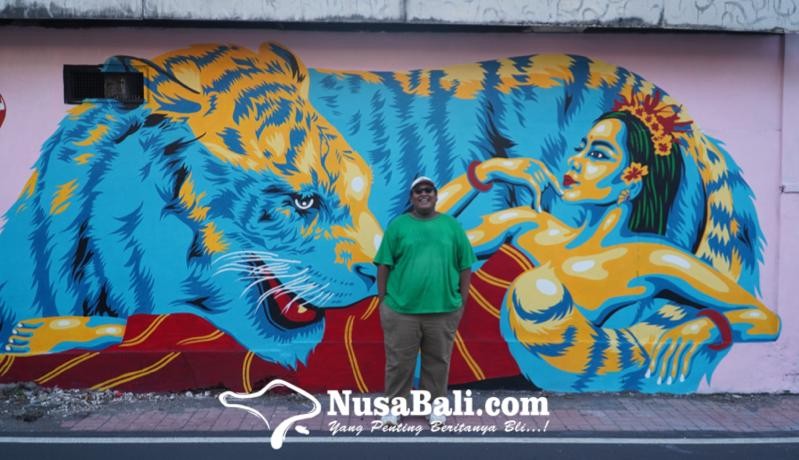 www.nusabali.com-mural-wanita-bali-dan-harimau-hiasi-dinding-dangin-puri