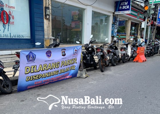 Nusabali.com - parkir-sembarangan-puluhan-motor-digembosi