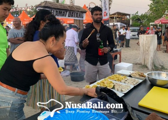 Nusabali.com - demo-masak-di-pantai-jerman-diserbu-wisatawan