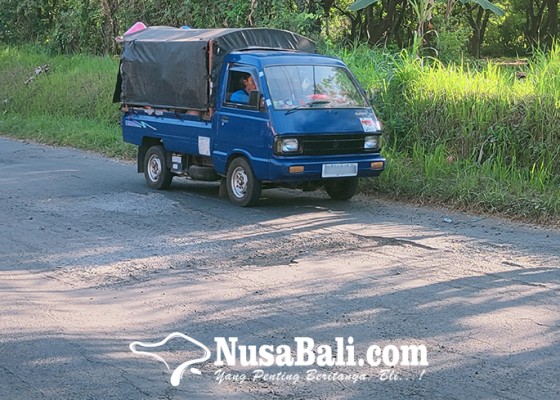 Nusabali.com - kerusakan-jalan-di-sawan