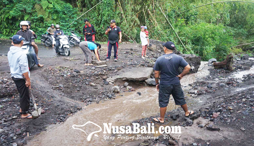 www.nusabali.com-lagi-banjir-terjang-jalur-budakeling-ababi