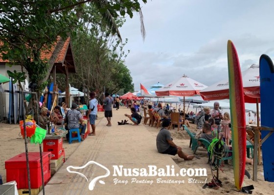 Nusabali.com - cuaca-cerah-jadi-daya-tarik-berwisata-ke-pantai-kuta