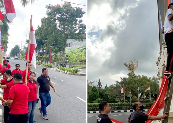 Nusabali.com - pegawai-gotong-royong-pasang-ribuan-bendera-merah-putih