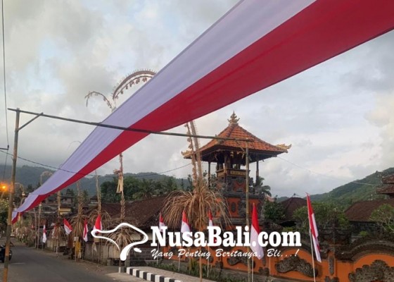Nusabali.com - st-banjar-pangi-bentangkan-bendera-merah-putih-ratusan-meter