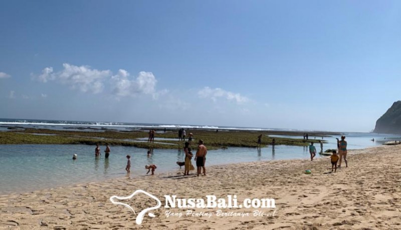 www.nusabali.com-pantai-melasti-banjir-wisatawan-tahun-2023-sudah-melewati-1-juta-pengunjung