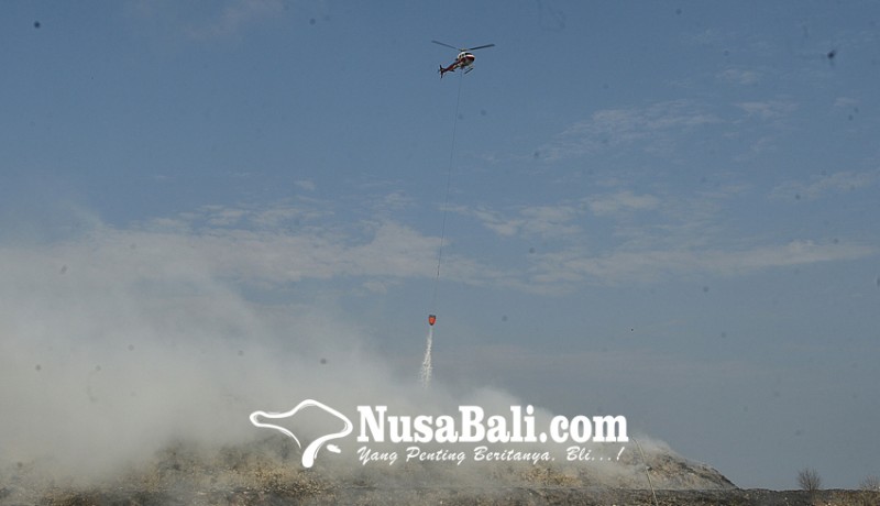 www.nusabali.com-heli-water-bombing-dikerahkan-ke-tpa-suwung