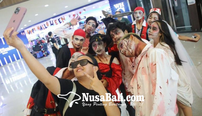 www.nusabali.com-penjaga-tenant-berkostum-horor-ada-face-painting-hingga-flash-mob