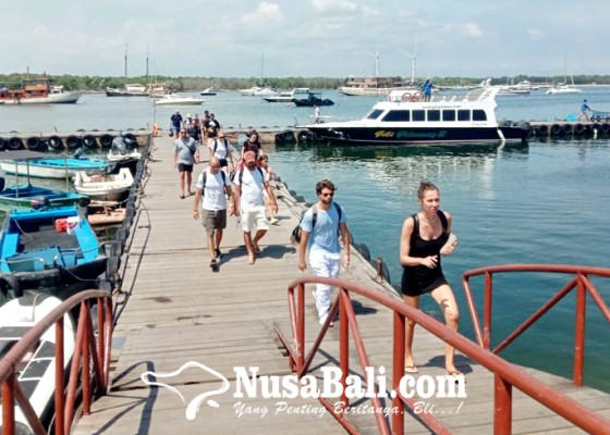 Nusabali.com - aktivitas-penyeberangan-di-pelabuhan-sira-angin-menurun