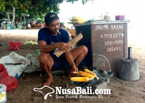 Nusabali.com - usaha-jagung-bakar-umkm-khas-pantai-sanur