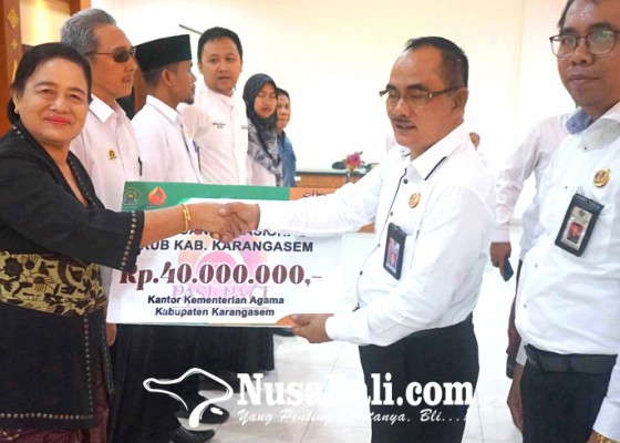 Nusabali.com - kemenag-salurkan-bansos-rp-318-miliar