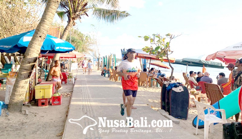www.nusabali.com-low-season-kunjungan-wisatawan-ke-pantai-kuta-normal