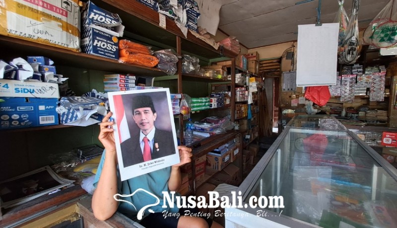 www.nusabali.com-sempat-digoda-produsen-penjual-di-denpasar-pilih-keluarkan-foto-prabowo-gibran-usai-pelantikan