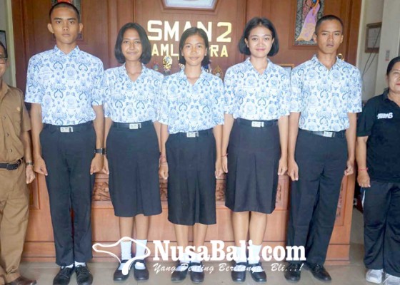 Nusabali.com - karangasem-loloskan-9-siswa-ke-paskibraka-bali