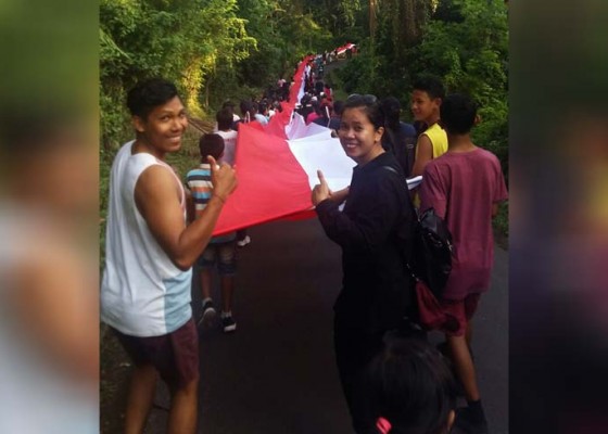 Nusabali.com - bendera-sepanjang-400-meter-dipasang-di-pantai-pandawa