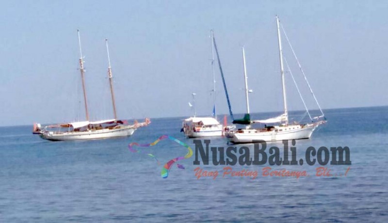 www.nusabali.com-belasan-yacht-mulai-bersandar-di-lovina