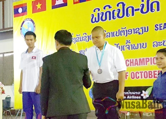 Nusabali.com - atlet-petanque-bali-sabet-emas-di-laos