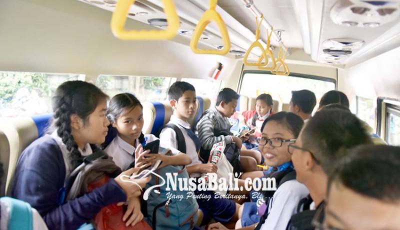 www.nusabali.com-bus-sekolah-kian-diminati-siswa