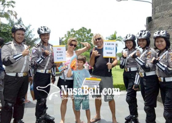 Nusabali.com - polisi-promosikan-bali-aman-dikunjungi
