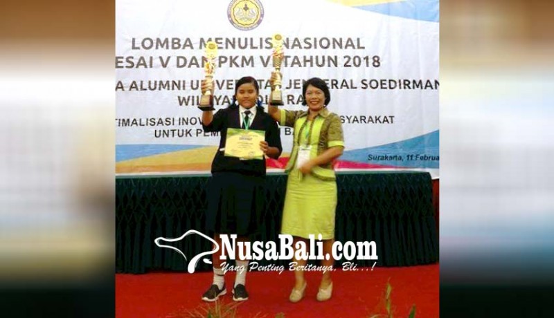 www.nusabali.com-kepala-smpn-2-manggis-juara-pembina-lkti-nasional