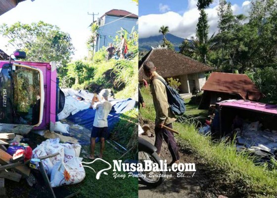 Nusabali.com - truk-terguling-timpa-jineng