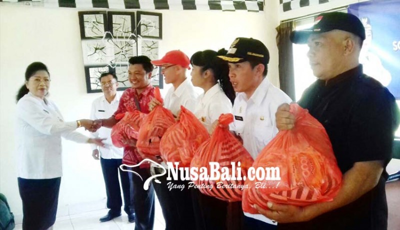 www.nusabali.com-dinas-pppa-bagikan-1000-sembako