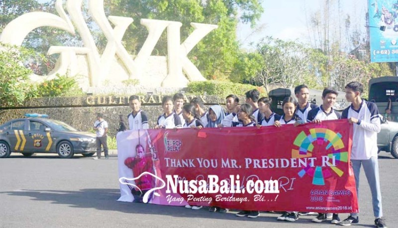 www.nusabali.com-spanduk-untuk-dukung-indonesia-sebagai-tuan-rumah-asian-games