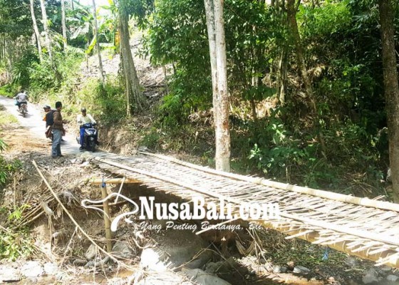 Nusabali.com - jembatan-penghubung-munduk-gobleg-masih-darurat