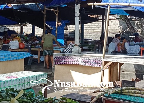 Nusabali.com - pedagang-pasar-bona-bertahan-meski-sepi