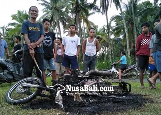 Nusabali.com - kabur-setelah-aksinya-kepergok-motor-milik-pelaku-dibakar-massa