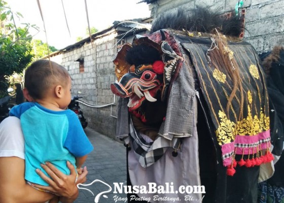 Nusabali.com - ngelawang-pertunjukan-seni-budaya-atau-ritual-religi