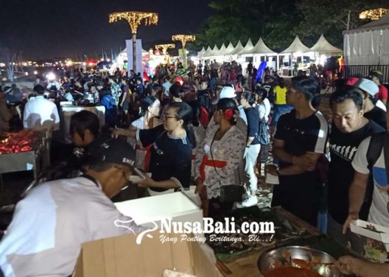 Nusabali.com - minawisata-festival-diawali-dengan-makan-ikan-gratis