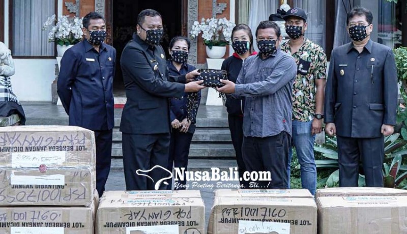 www.nusabali.com-bali-united-bagikan-20-ribu-masker