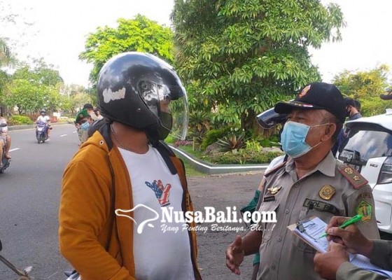 Nusabali.com - hampir-4-pekan-operasi-masker-aparat-jaring-174-pelanggar