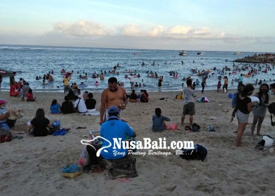 Nusabali.com - pantai-jadi-pusat-kerumunan-pemkot-akan-lakukan-komunikasi-dengan-satgas-desa-adat