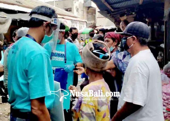 Nusabali.com - pelindo-iii-celukan-bawang-gandeng-polri-tni-jurnalis-dan-lsm-bagi-masker