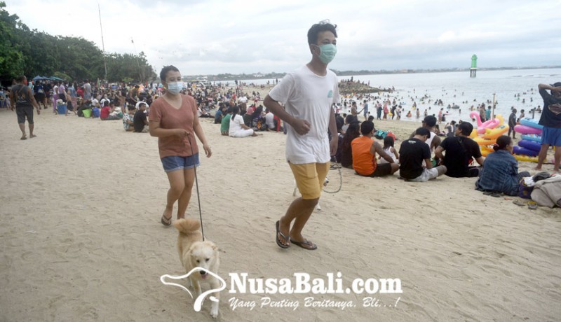 www.nusabali.com-akhir-libur-panjang-pantai-di-denpasar-ramai-pengunjung