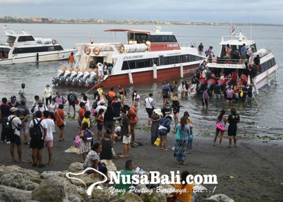 Nusabali.com - wisatawan-kembali-dari-nusa-penida-dan-nusa-lembongan-di-dermaga-sanur-di-masa-liburan-panjang