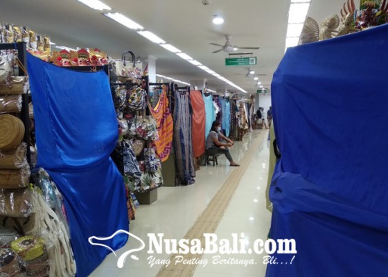 Nusabali.com - pasar-seni-sukawati-buka-transaksi-masih-sangat-lesu